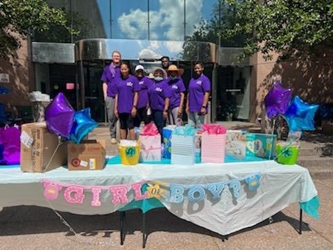 SolutionsbyLynn volunteers at a social event